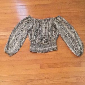 Michael Kors animal print off the shoulder blouse.